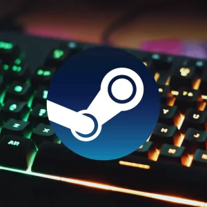 montagem mostra um teclado gamer no fundo com luzes rgb e o simbolo do steam no centro de forma destacada